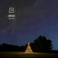 Fairybell Standard 2 metre in warm white in a field under a starry sky, 200 cm including pole