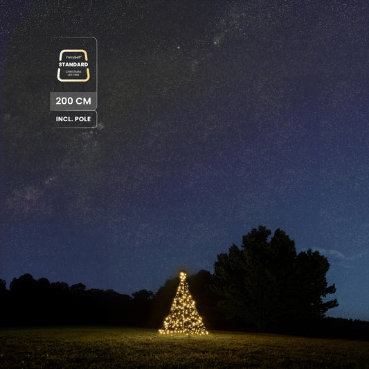 Fairybell Standard 2 metre in warm white in a field under a starry sky, 200 cm including pole