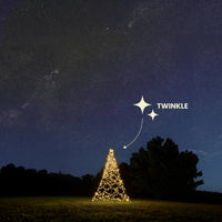 Fairybell Standard 3 metre Twinkle on a lawn at night with a star icon marking the twinkle effect