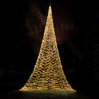 Fairybell Premium 10 metre 8000 LED glowing warm white on a dark lawn under the stars