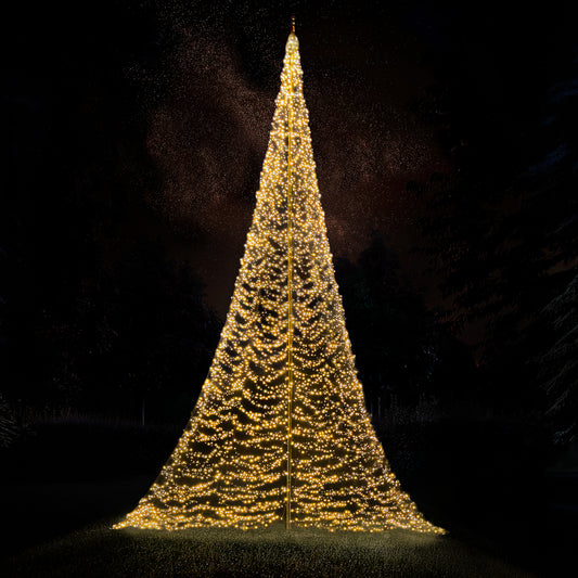 Fairybell Premium 10 metre 8000 LED glowing warm white on a dark lawn under the stars