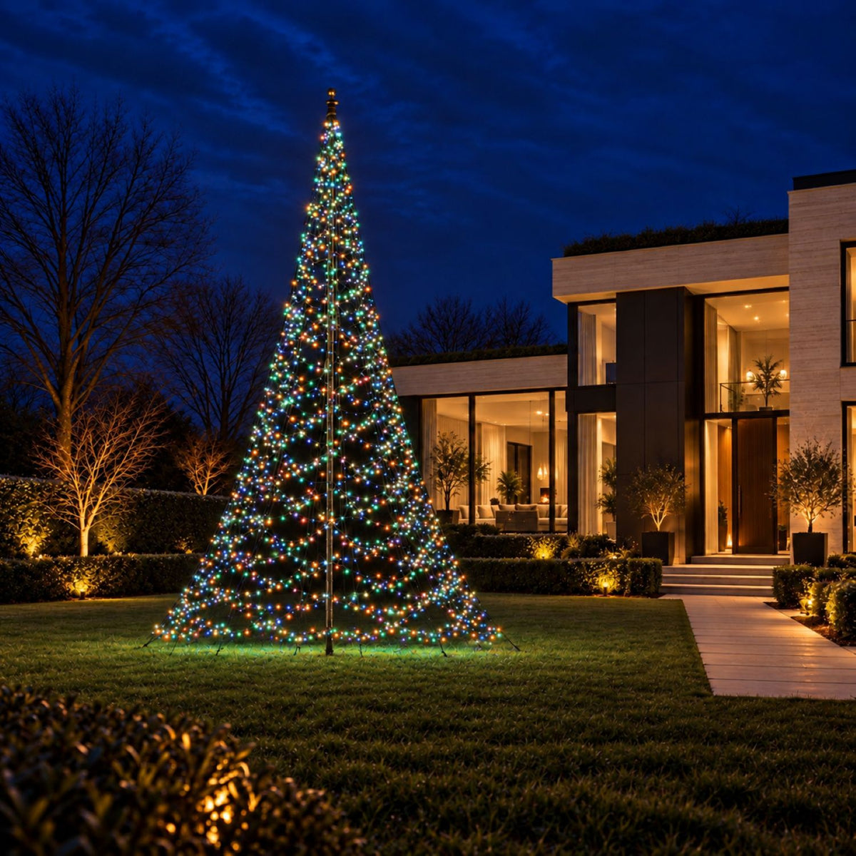 Fairybell Premium 10 metre 8000 LED in multicolour mode in the garden of a modern villa in the evening
