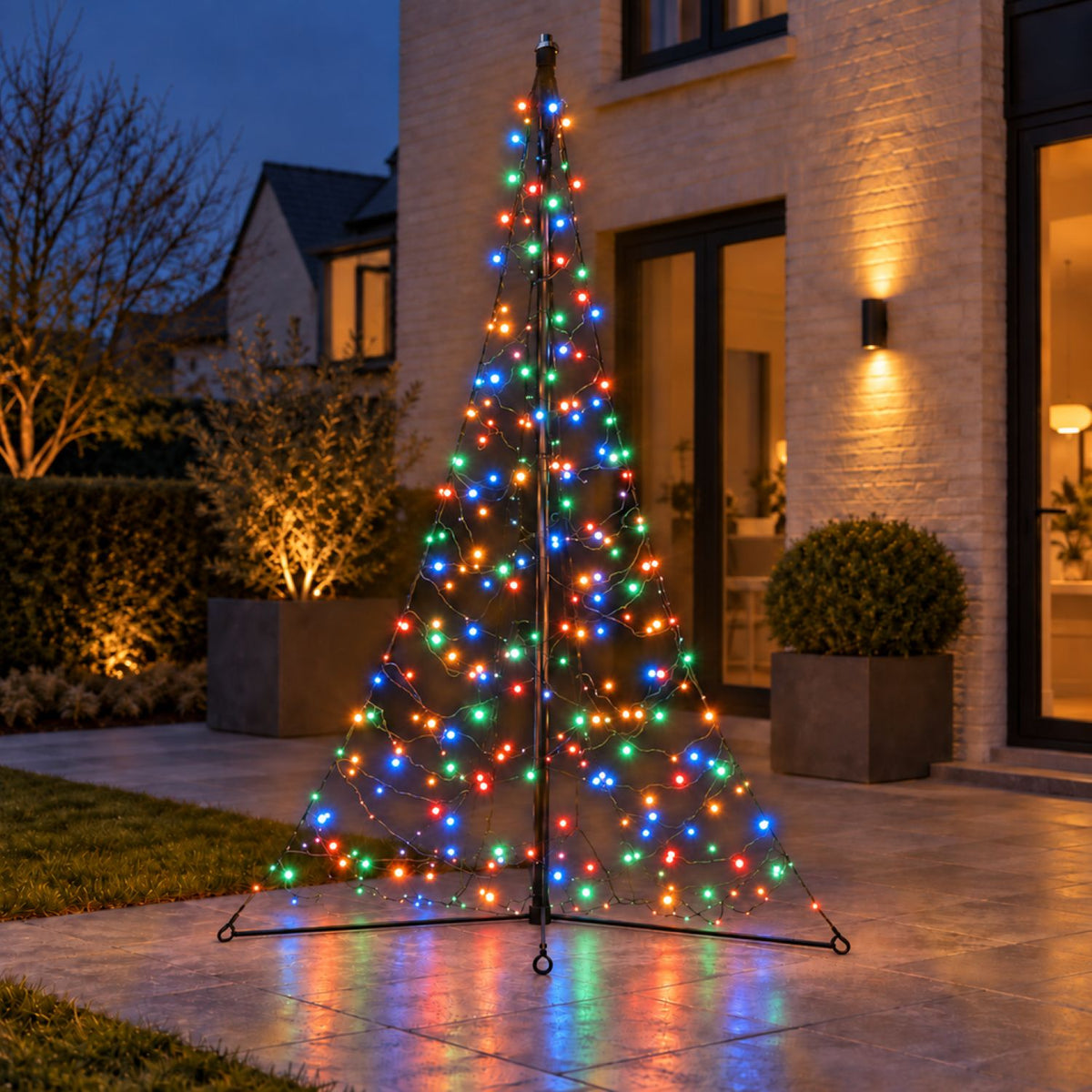 Fairybell Premium 2 metre All-Surface in multicolour on a paved patio with reflections of the coloured bulbs