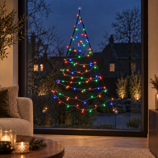 Fairybell Premium Window Tree 1.25 metre in multicolour on the living room window overlooking houses in the evening