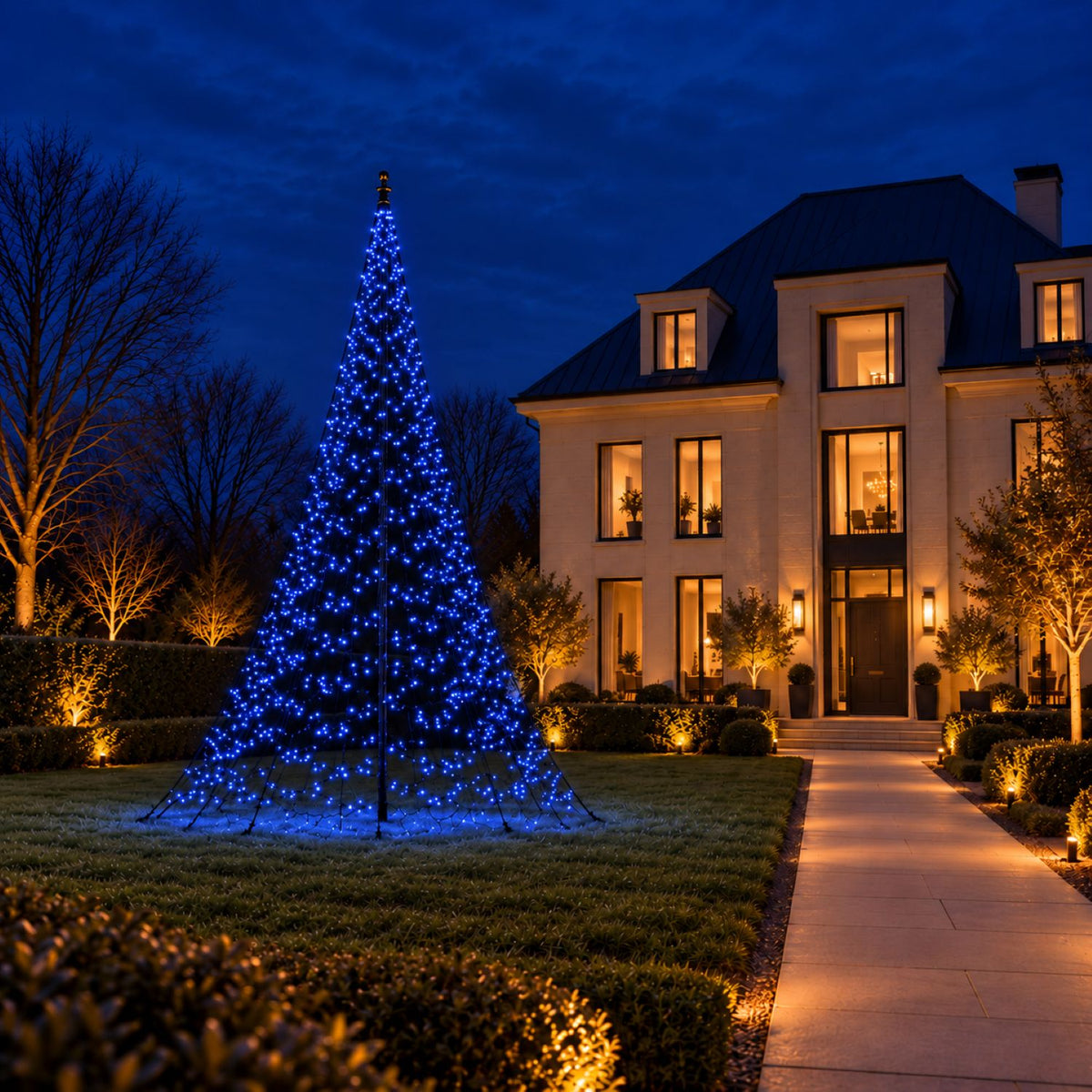 Fairybell Pro 10 metre in blue light on the lawn outside a villa
