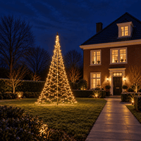 Fairybell Standard 4 metre Twinkle lit in warm white in the front garden of a brick house in the evening